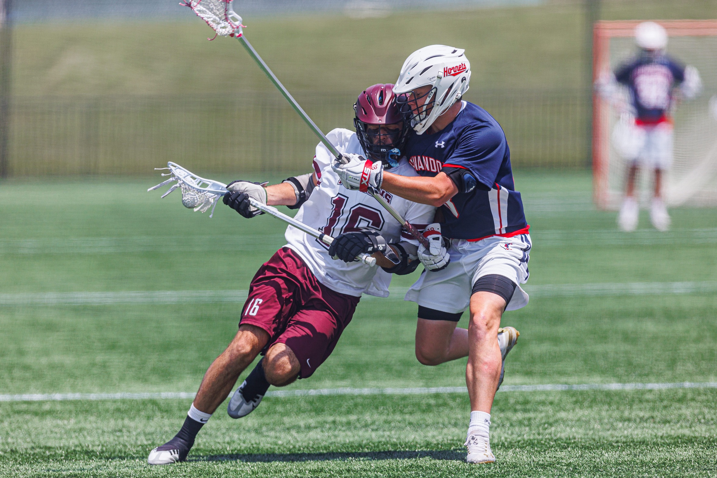 action photo of RC men's lacrosse player George Gilbert