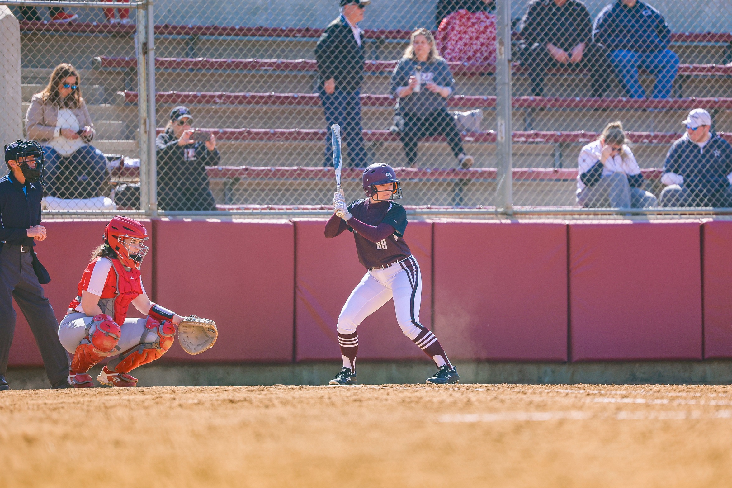 action photo of RC softball player Madison Courts at the plate