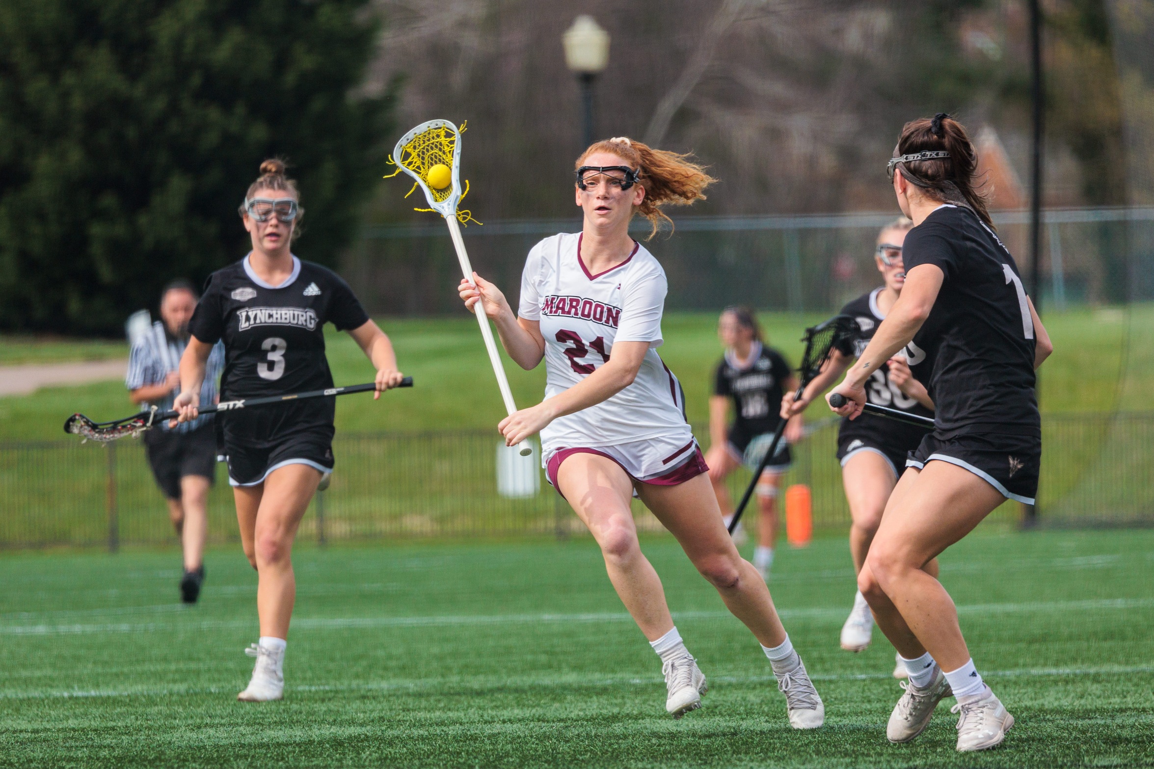 action photo of RC women's lacrosse player Emerson Foster