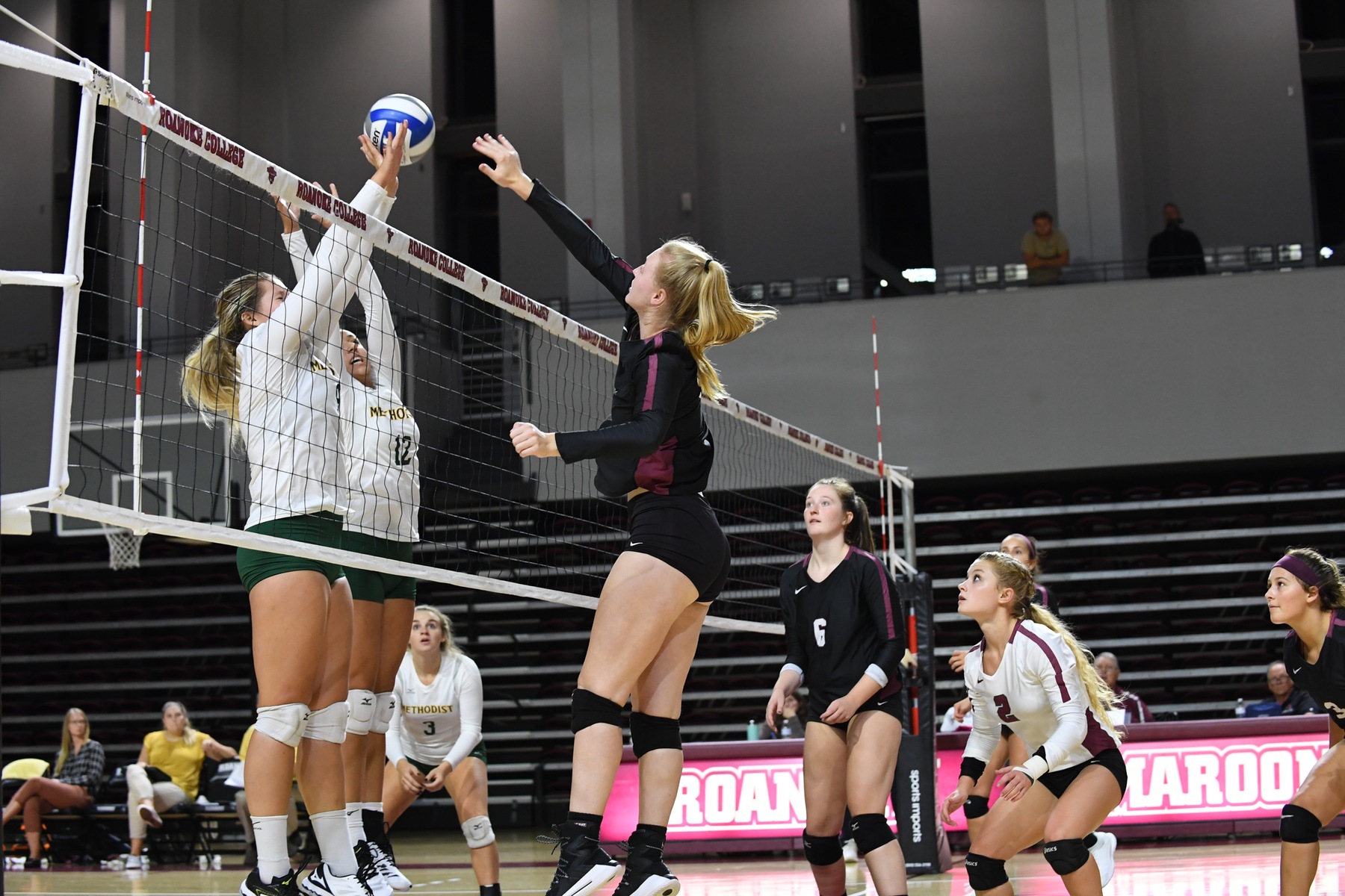 action photo of Roanoke Vb player Keely Scott attacking at the net