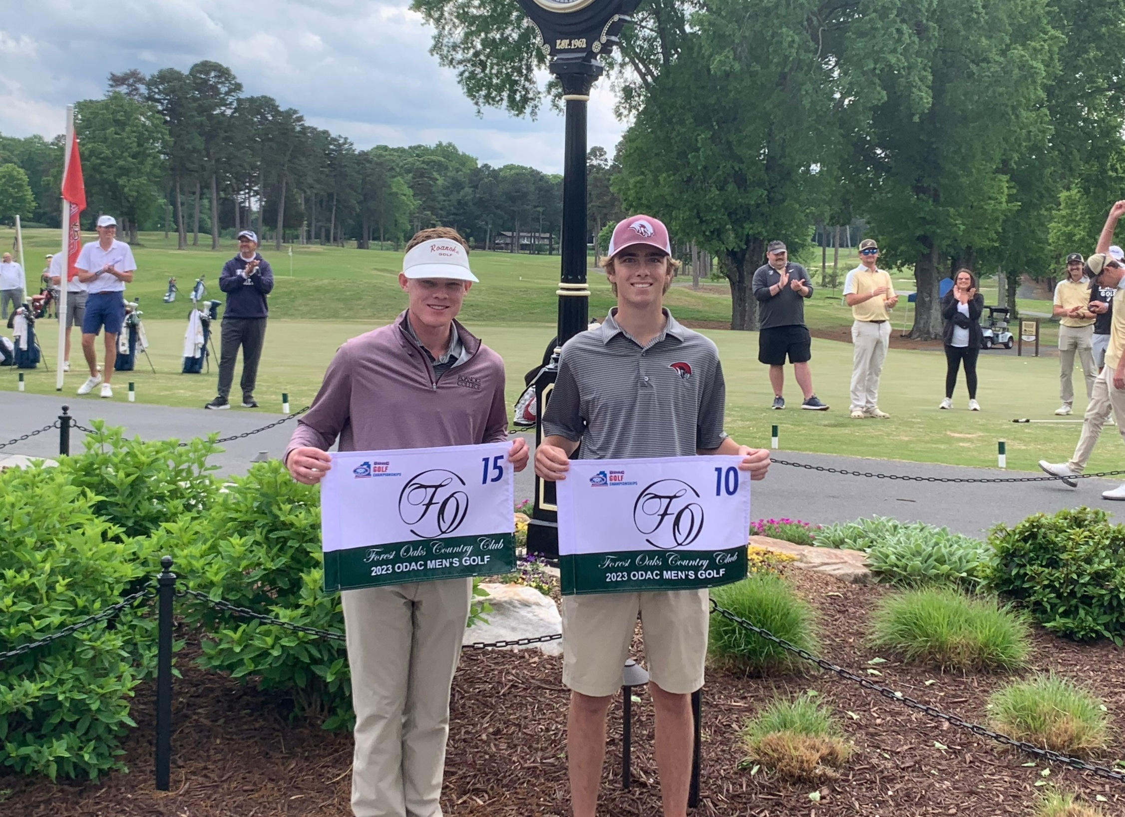 Palmer Cuny (l) and TJ Whelan with flags from the ODAC Championships