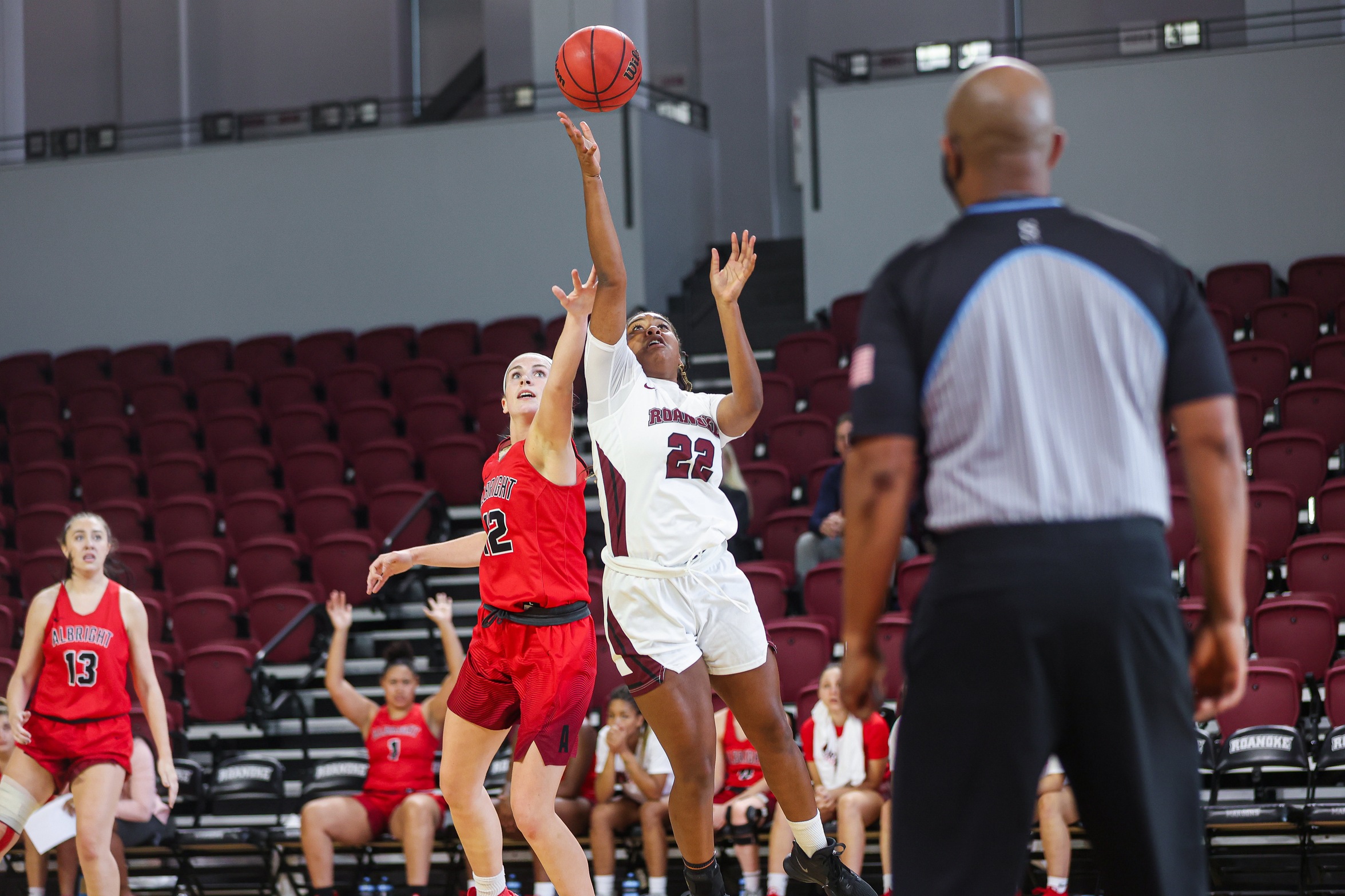 action photo of RC women's basketball player Laure Keel scoring