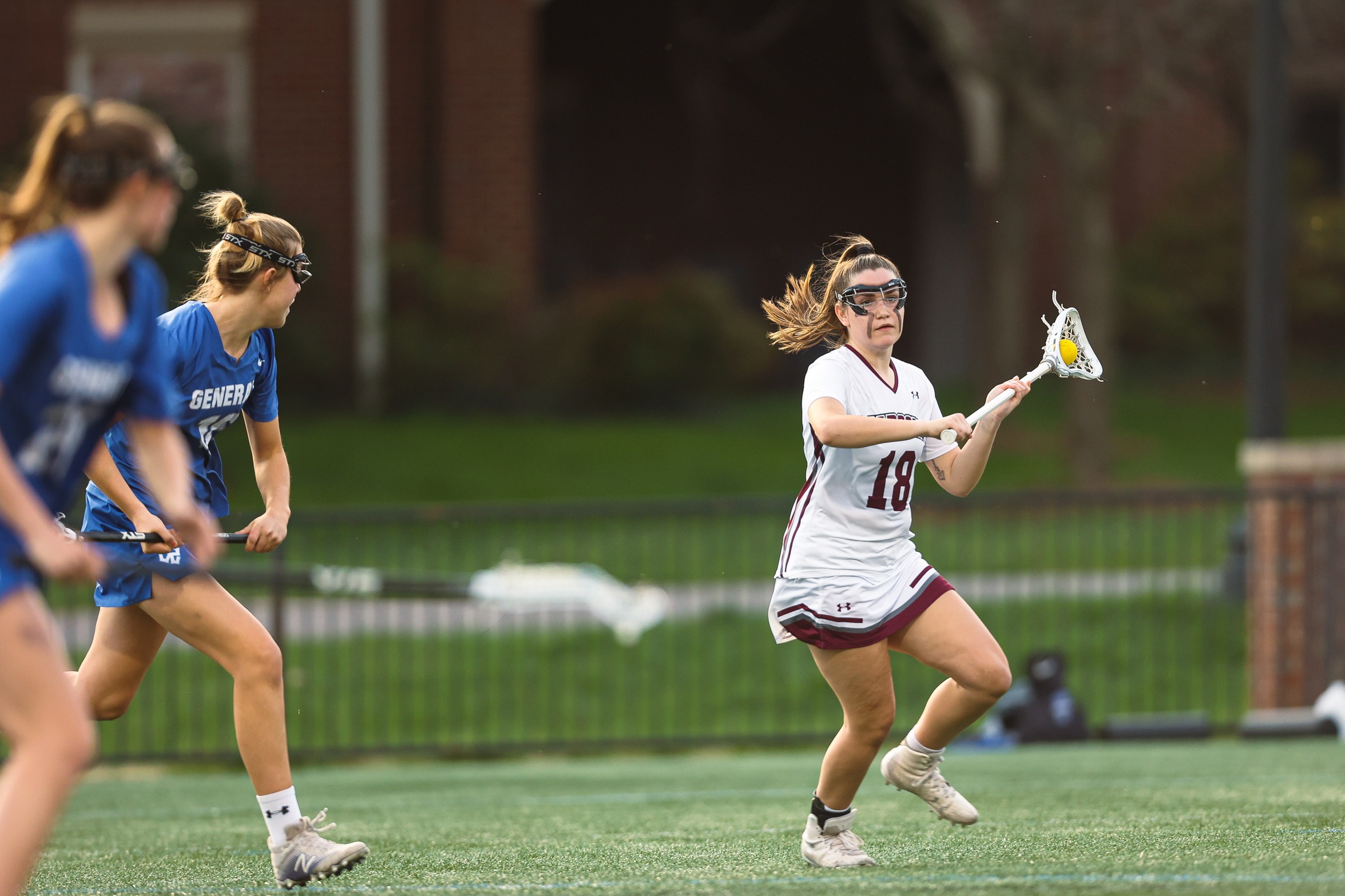action photo of Tiernan Connor, RC WLAX with the ball 