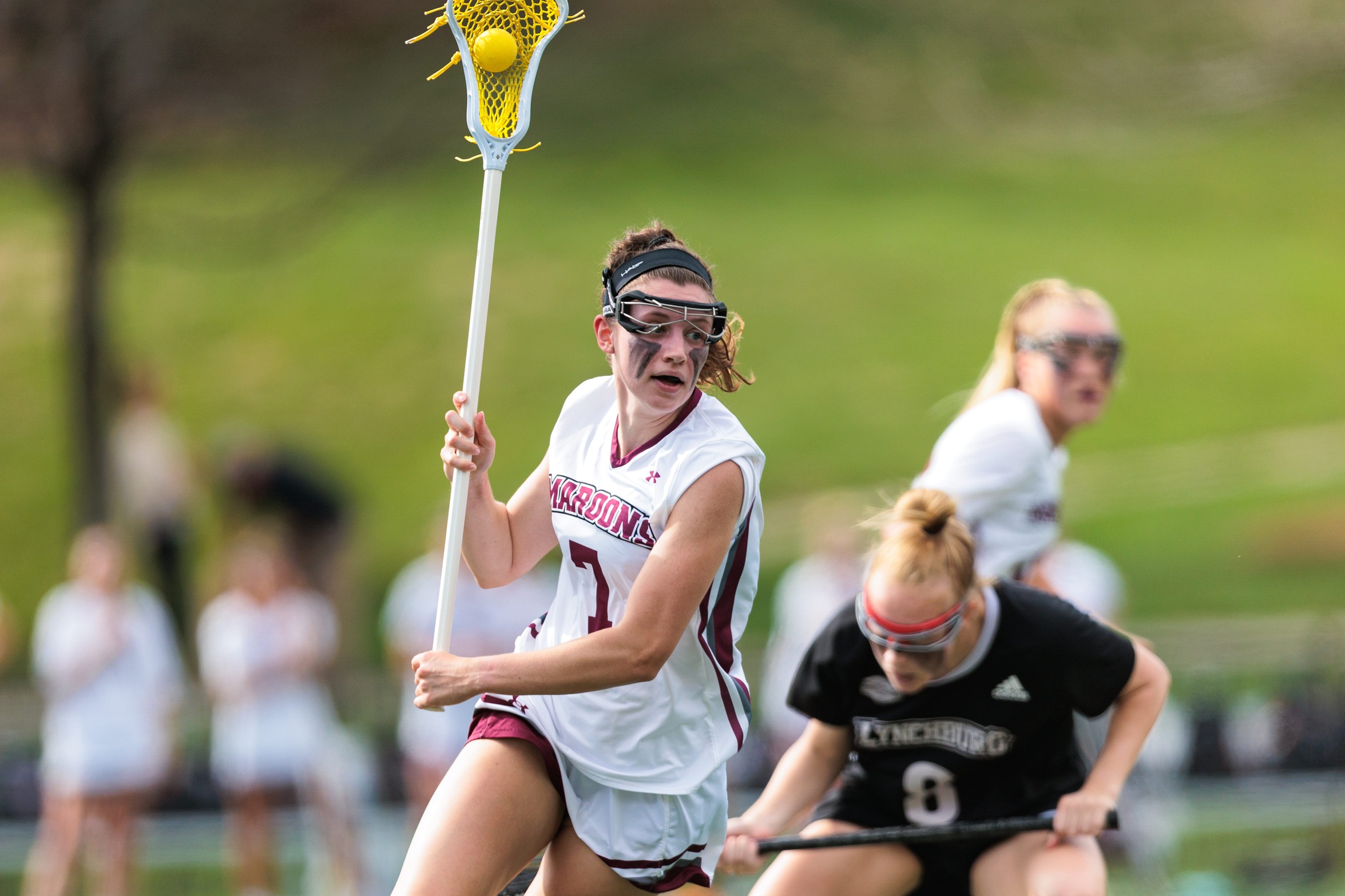 action photo of RC women's lacrosse player Lilly Blair