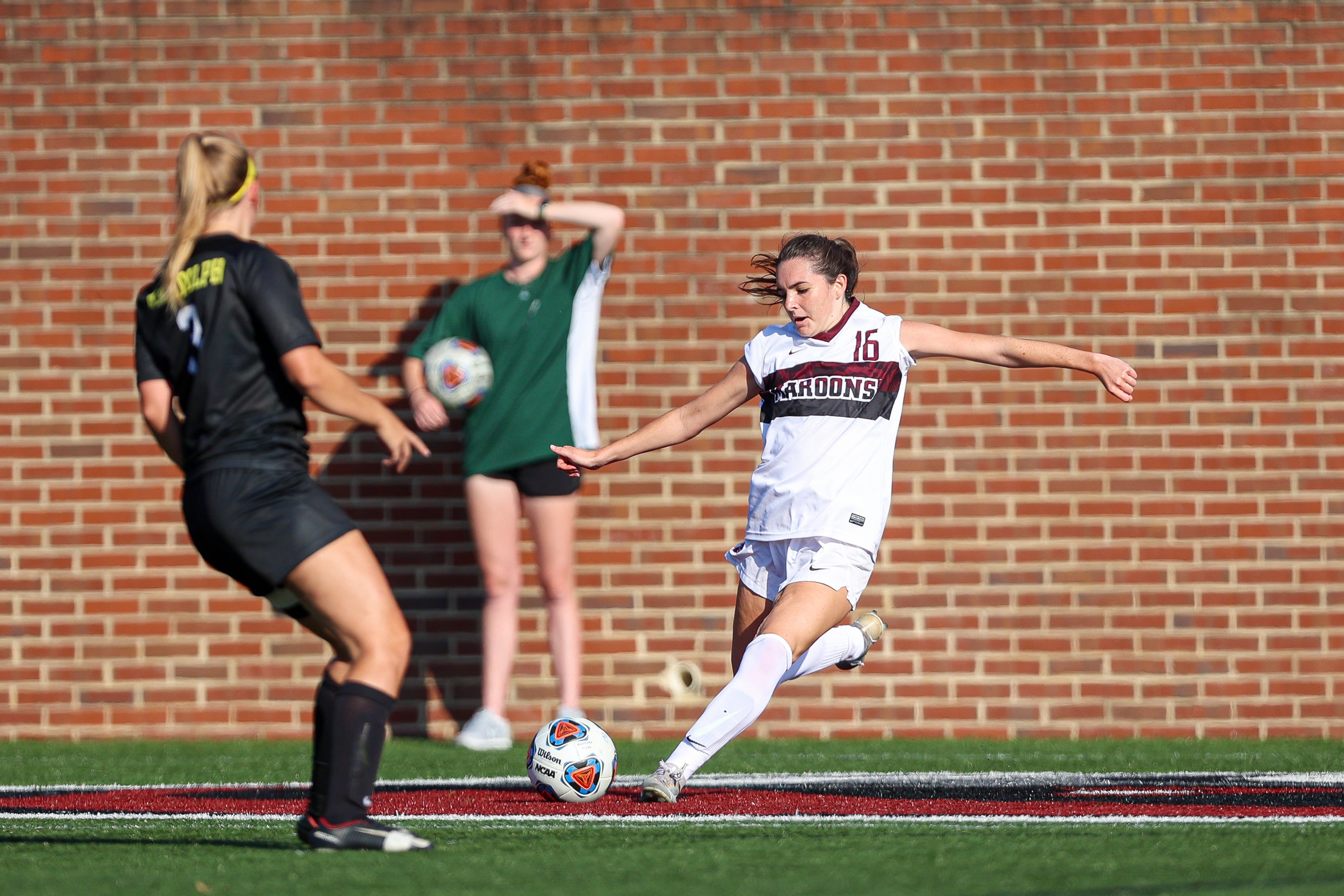 action photo of RC women's soccer player MC Petrucelli
