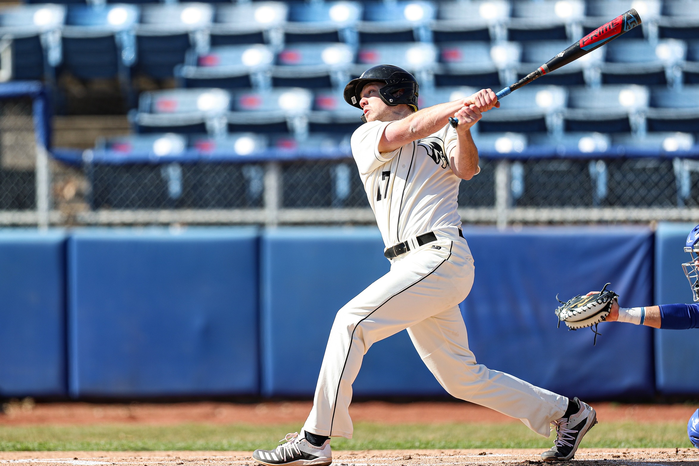 action photo of RC baseball player Will Merrikan hitting