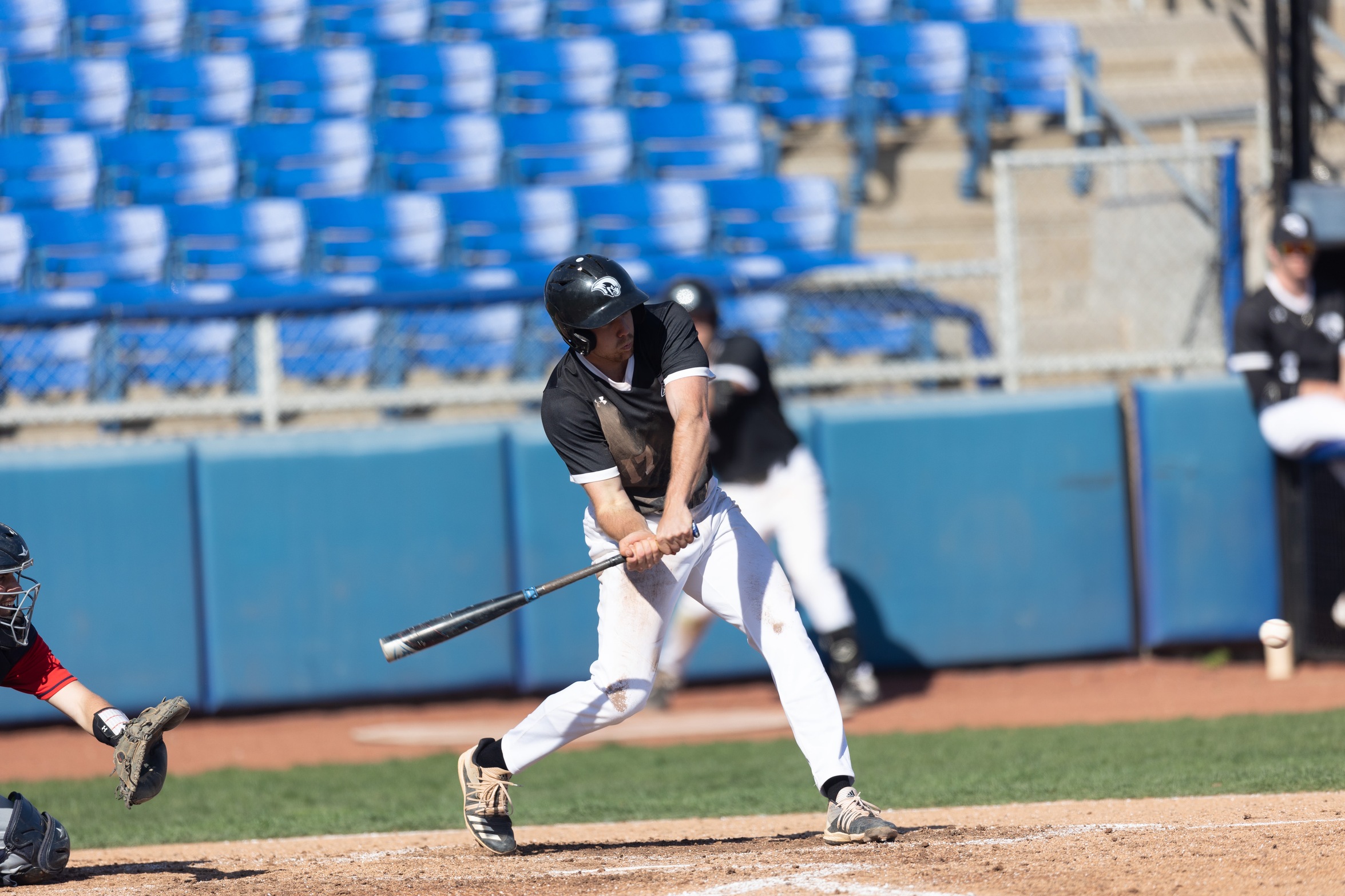 action photo of RC baseball player Will Merriken hitting