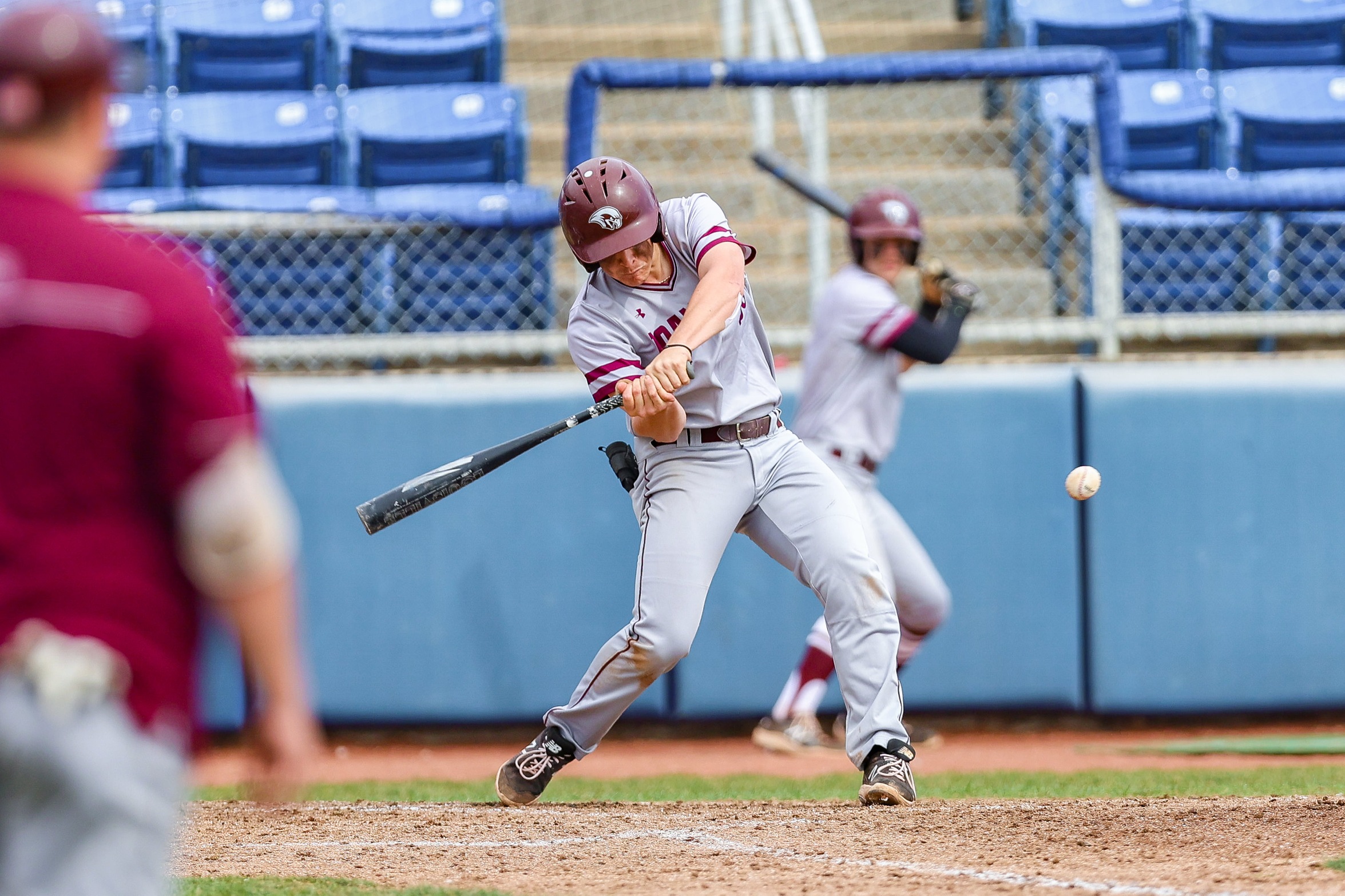 action photo of Jonny Wall, RC baseball, swinging at a pitch