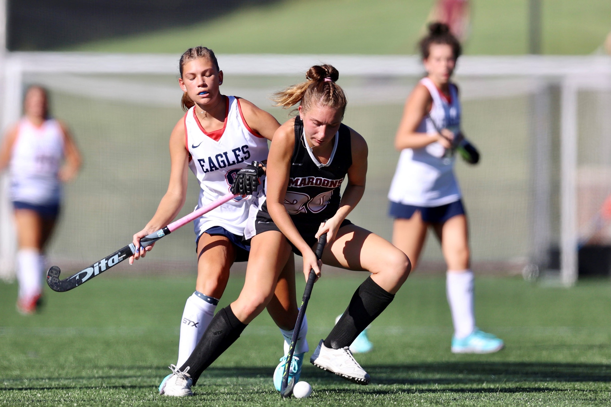 action photo of RC field hockey player Claudia Roncone with the abll