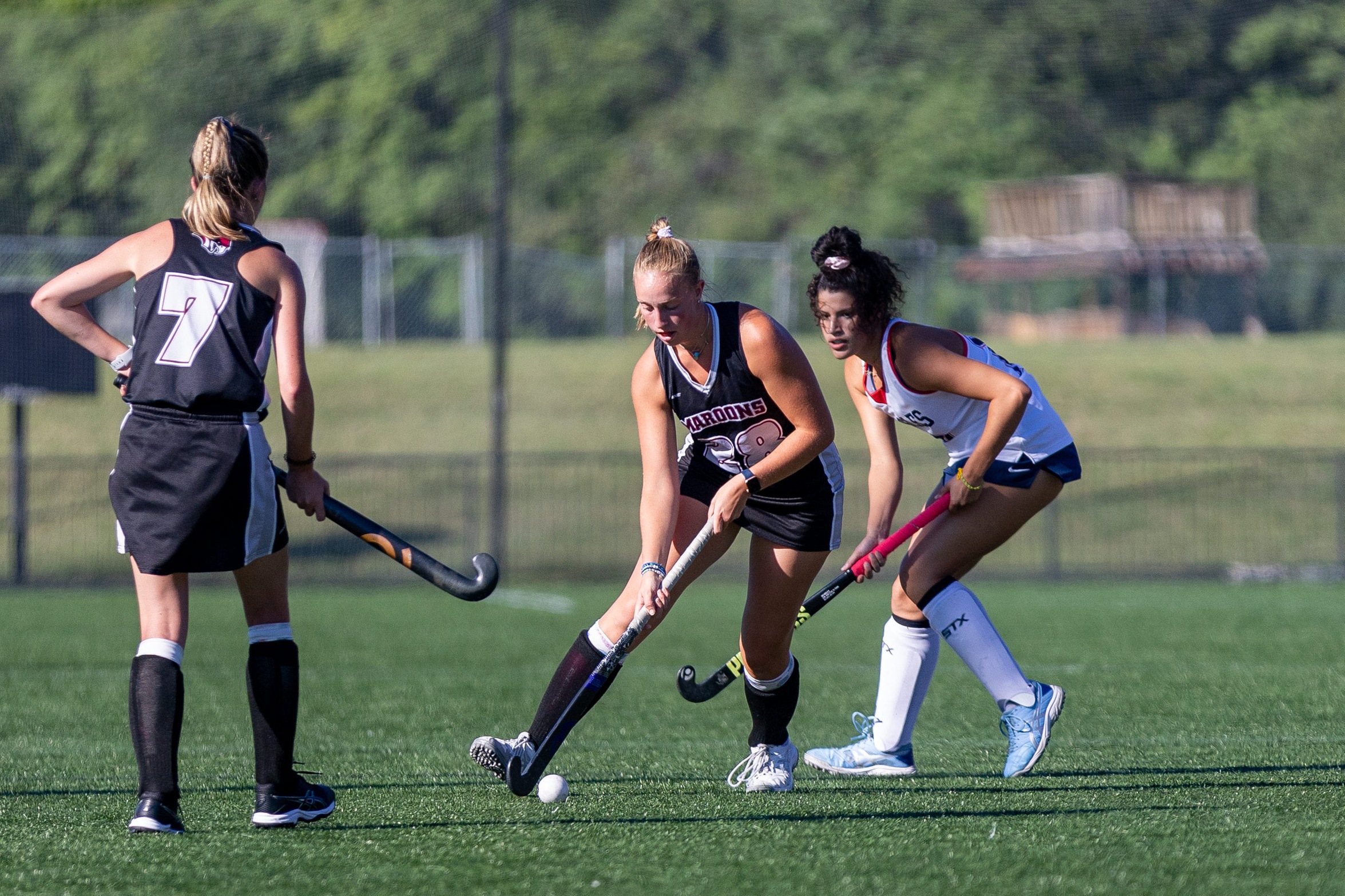 action photo of RC field hockey player Emily Gabrielian with the ball