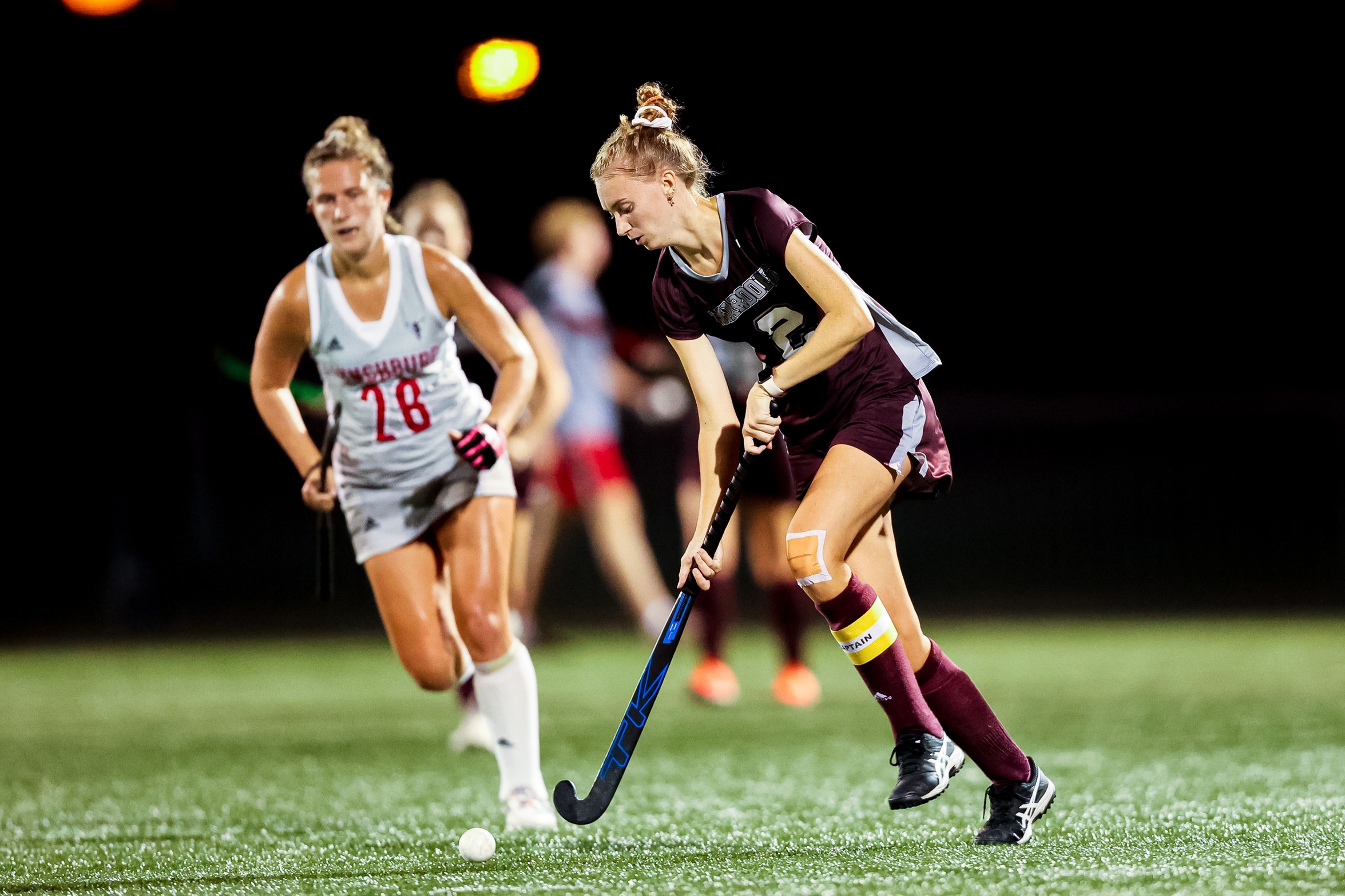 action photo of RC field hockey player Emilee Wooten against Lynchburg
