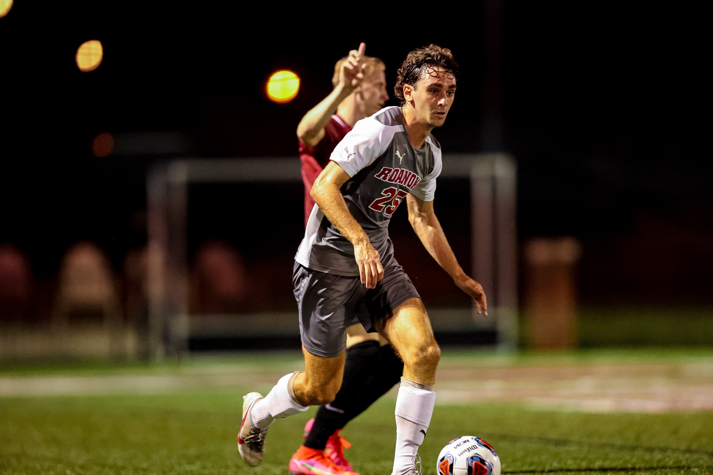 action photo of RC men's soccer player Jake Berecz