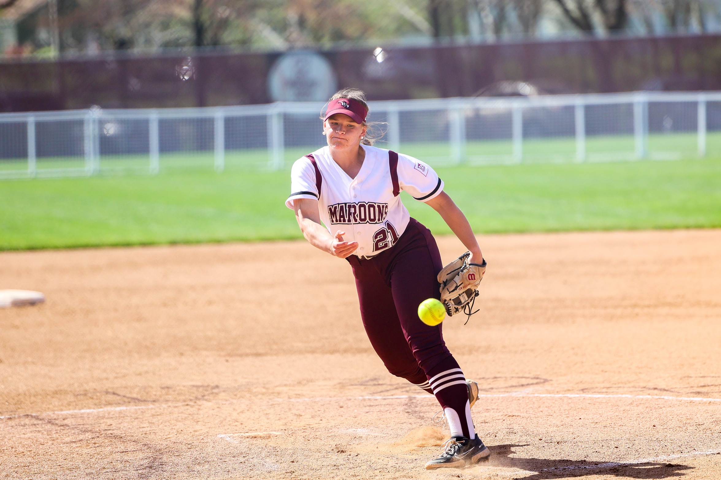 action photo of Roanoke softball pitcher Shanan Hester in the circle pitching