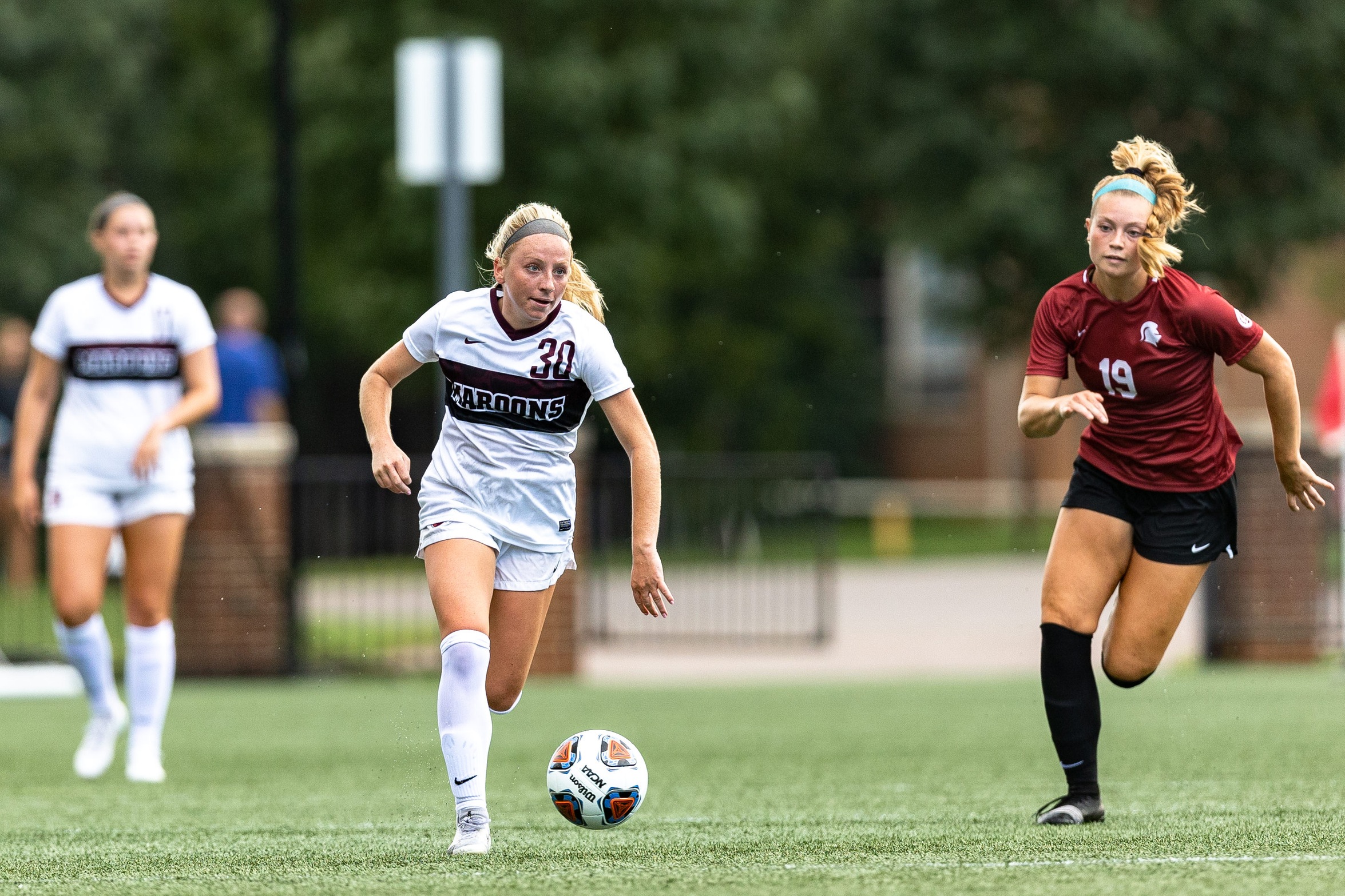 action photo of RC women's soccer player Morgan O'Neill (30)